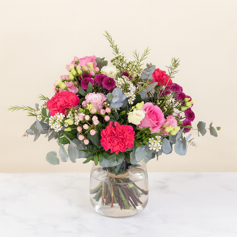 Bouquet Éternelle Gratitude Interflora roses lisianthus eucalyptus tons roses et violets livraison interflora bloomyrama