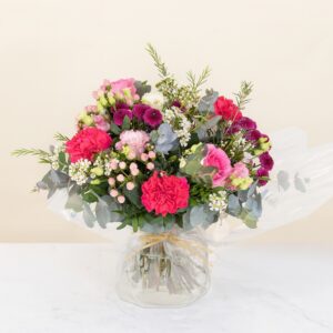 Bouquet Éternelle Gratitude bulle d'eau roses lisianthus eucalyptus tons roses et violets livraison interflora bloomyrama