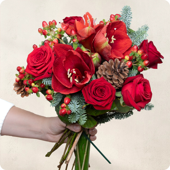 Bouquet Nuit de fête amaryllis rouges roses écarlates feuillages baies 123fleurs disponible sur bloomyrama