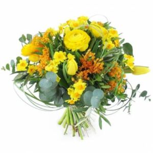 Bouquet rond jaune orange jonquilles tulipes L'Agitateur floral disponible sur bloomyrama