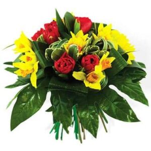 Bouquet rond jonquilles jaunes tulipes rouges L'Agitateur floral disponible sur bloomyrama