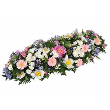 Raquette de deuil rose et bleu avec pivoines gerberas et agapanthes L'Agitateur Floral vu sur bloomyrama