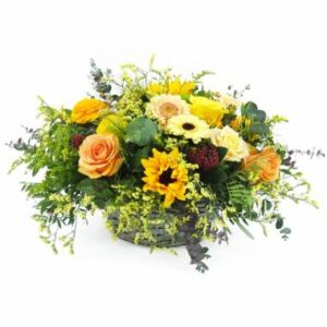panier de deuil orange jaune avec roses gerberas tournesols et feuillage Agitateur Floral disponible sur bloomyrama