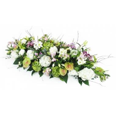 Dessus de cercueil rose mauve et blanc avec lys orchidées et hortensia L'Agitateur Floral vu sur bloomyrama