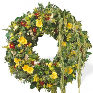 Couronne de deuil jaune verte et rouge avec roses gerberas et santinis 80 cm l’Agitateur Floral disponible sur le comparateur bloomyrama