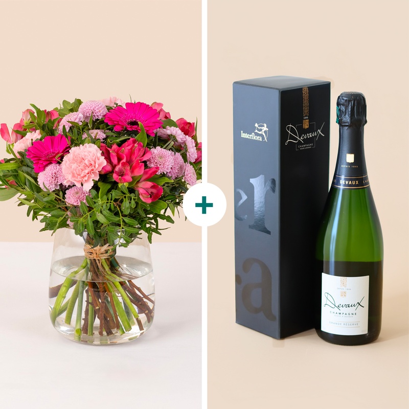 Bouquet de fleurs roses camaieu avec champagne bouteille elegante Interflora disponible sur bloomyrama